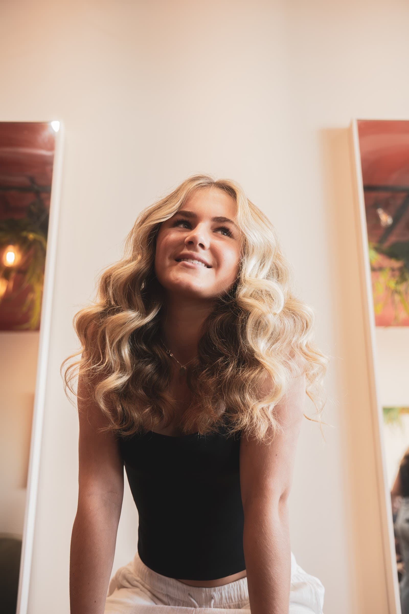 Soft blonde waves styled at Full Circle Hair Society